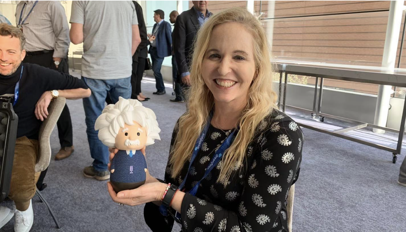 Coresight Research CEO and Founder Deborah Weinswig with an Einstein Intelligent Voice Assistant at Dreamforce 2019.