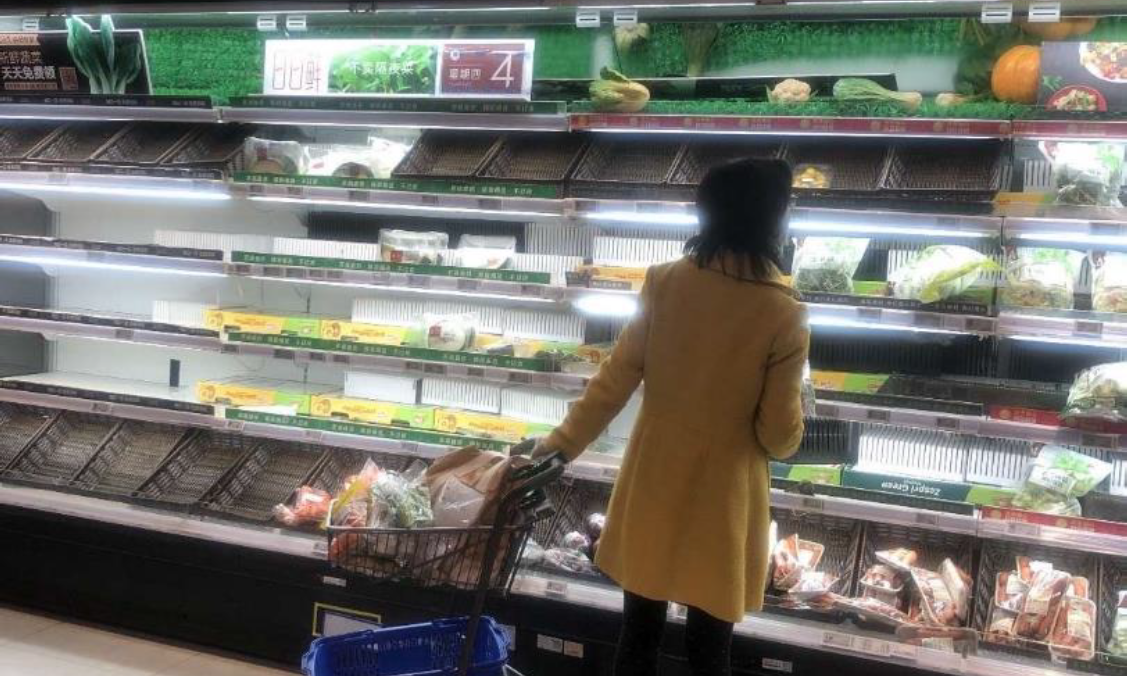 Depleted market shelves in Shanghai in the evening