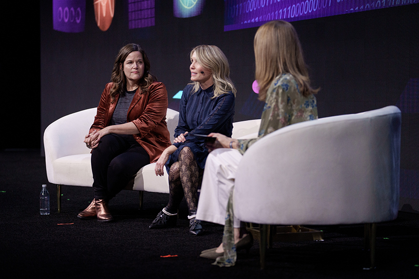 A group of women sitting on a couch Description automatically generated