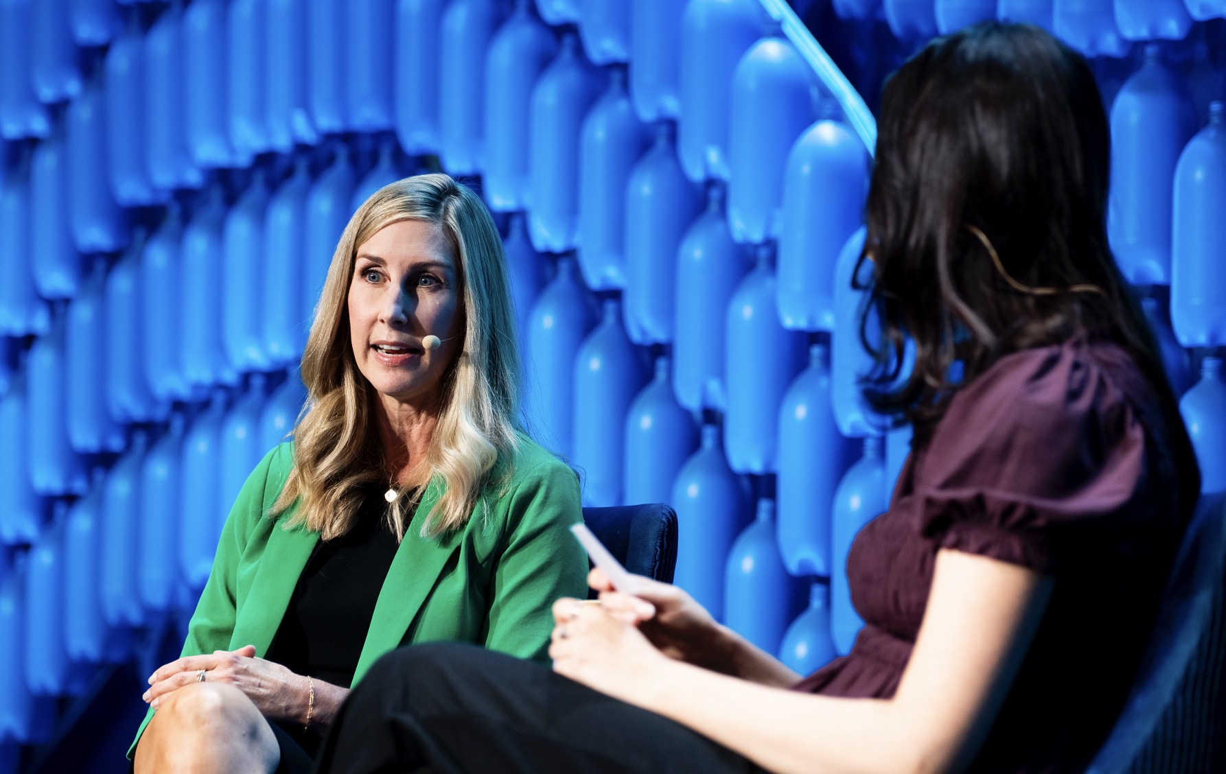 A person talking to another person AI-generated content may be incorrect.